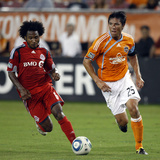 Houston September 18 - Brian Ching and Julian de Guzman