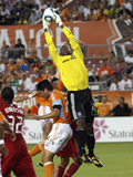Houston August 21 - Brian Ching and Sean Johnson