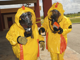 Firefighters Dressed in Hazmat Suits