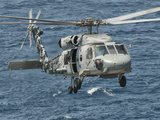 A US Navy SH-60F Seahawk Flying Off the Coast of Pakistan