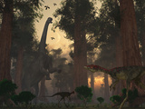 A Camarasaurus Dinosaur Feeding While a Pair of Compsognathus Sneak Around