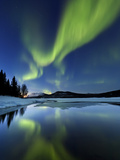 Aurora Borealis over Sandvannet Lake in Troms County, Norway