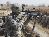 A U.S. Army Soldier Looks Through the Scope of His M-14 Sniper Rifle