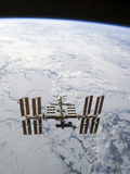 Buy The International Space Station in Orbit Above Earth at AllPosters.com