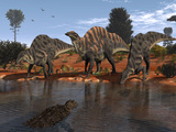 Buy Ouranosaurus Drink at a Watering Hole While a Sarcosuchus Floats Nearby at AllPosters.com