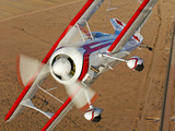 A Pitts Model 12 Biplane in Flight