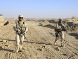 Soldiers Conduct a Perimeter Security Check around a Combat Outpost in Diwar, Afghanistan