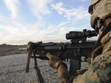 A Soldier Sights in to Fire on a Target on a Shooting Range