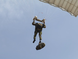 A Member of the Pathfinder Platoon Prepares to Land from a Parachute Jump