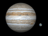 Artist's Concept Comparing the Size of the Gas Giant Jupiter with That of the Earth