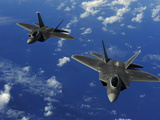 U.S. Air Force F-22 Raptors in Flight Near Guam Fotografie-Druck