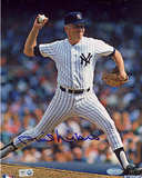 Phil Niekro Autographed Yankees Pinstripe Uniform Pitching Vertical Photograph