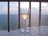 Buy A Glass of White Wine on the Balcony of a Condo at Gulf Shores at AllPosters.com
