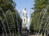 Marble Statue Stands in the Gardens of Peterhof