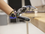 Buy A Patient Performs Functional Tests with the Proto 1 Arm at AllPosters.com