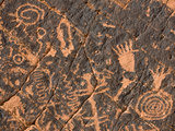 Ancient Petroglyphs on a Rock Face
