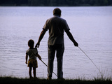 Buy A Man and a Boy Fishing Along the Shore of Lake Banyoles at AllPosters.com