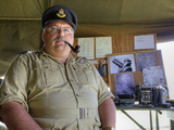 A Flight Lieutenant in Military Garb Smokes a Pipe