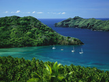 Sailboats Anchored in a Cove of Blue Water on Nuku Hiva Island