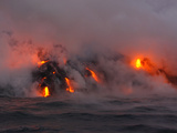 Buy Hot Magma Spills into the Sea from under a Hardened Lava Crust at AllPosters.com