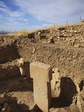 Buy A Pillar with a Carved Vulture Stands at Gobekli Tepe at AllPosters.com