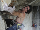 A Climber Grips the Roof of Gravity Ceiling on Higher Cathedral Rock