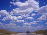 Clouds in a Vast Sky Above a Highway in Montana