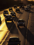 Buy Cars Silhouetted on I-94 Interstate at Sunset at AllPosters.com