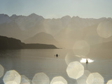 Kayakers Paddle in Glassy Calm Conditions on Lake Manapouri