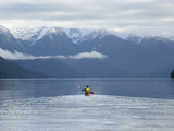 A Kayaker Paddles in the Hope Arm of Lake Manapouri