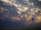 Cloud Formations Above a Water Tower on the Edge of Pine Ridge
