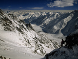 A Climber Takes a Short Rest During the Ascent to Nanga Parbat's Camp