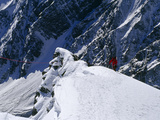 A Climber Ascends a Steep Section of Ice on Nanga Parbat's Slopes