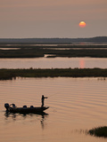 A Sport Fisherman Flyfishing in the Kvichak River at Sunset