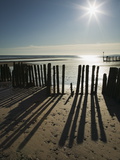 Silhouette of the Remains of a Groyne on the Beach at Dawlish Warren