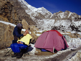 A Mountain Climber Has His Haircut Beneath the Looming Nanga Parbat