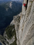 A Climber, Without a Rope, Clings with Fingertips to Half Dome