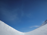 An Extreme Trekker Skis over an Unnamed Pass
