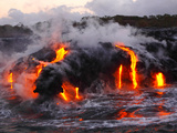 Buy Hot Magma Spills into the Sea from under a Hardened Lava Crust at AllPosters.com