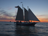 A Sailboat Off Grand Haven Pier on Lake Michigan at Twilight