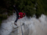 Buy A Climber Swings on a 200-Foot-Long Rope known as the Alcove Swing at AllPosters.com