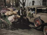 Buy A Woman in a Car Buys Flowers from a Street Vendor in Dupont Circle at AllPosters.com