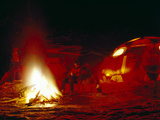 A Climbing Team Celebrates Christmas Eve with a Bonfire at Base Camp