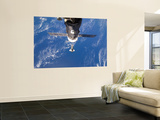 Buy Space Shuttle Discovery Approaches the International Space Station at AllPosters.com