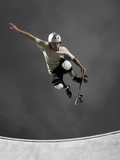 Skateboarder Performing Tricks