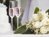 Wedding bouquet and champagne glasses
