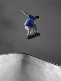 Skateboarder Performing Tricks