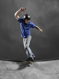 Skateboarder Performing Tricks