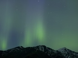 Aurora Borealis over Mountain Range Photographic Print