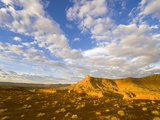 Clouds Over Buttes at Sunrise